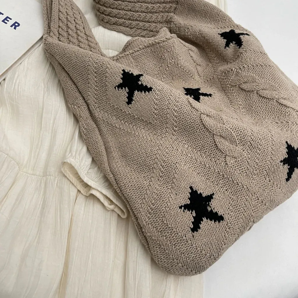 Bolsa feminina artesanal em crochê, estilo boho chic. Leve, estilosa e perfeita para looks de verão e momentos casuais.