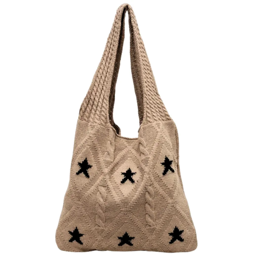 Bolsa feminina artesanal em crochê, estilo boho chic. Leve, estilosa e perfeita para looks de verão e momentos casuais.