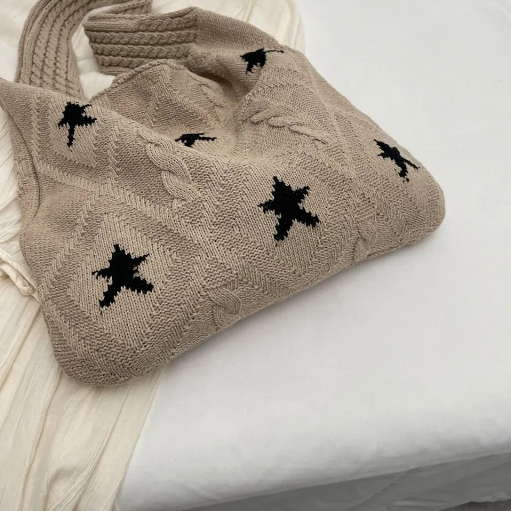 Bolsa feminina artesanal em crochê, estilo boho chic. Leve, estilosa e perfeita para looks de verão e momentos casuais.