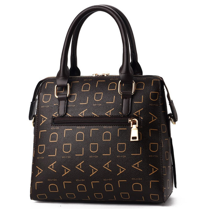 Bolsa feminina estruturada com acabamento premium e design sofisticado. Ideal para compor produções clássicas com elegância e funcionalidade.