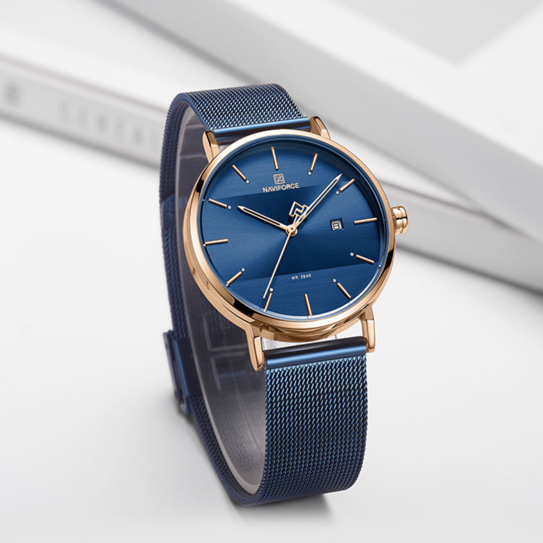 Relógio feminino modelo Navi com design casual, mostrador azul e pulseira metálica ajustável